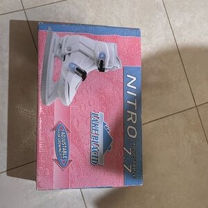 Adjustable ice skate worn once